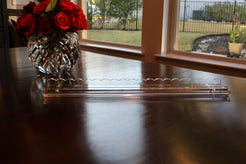 acrylic scalloped rack with magnetic pusher, clear