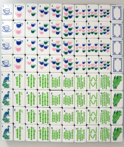 Set of tiles with various designs including cups, bamboo, and birds on a white background.