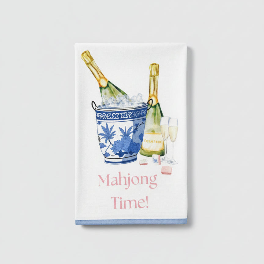 tea towel with champagne bottles and 'Mahjong Time!' text on a white background